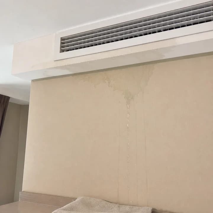 AC leak photo attached by tenant